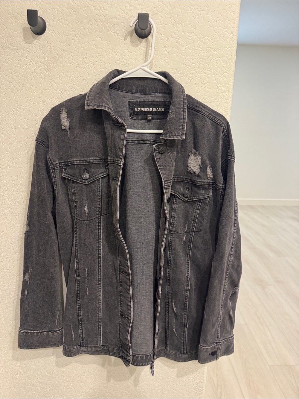 Express Woman’s Distressed Charcoal Denim Jacket